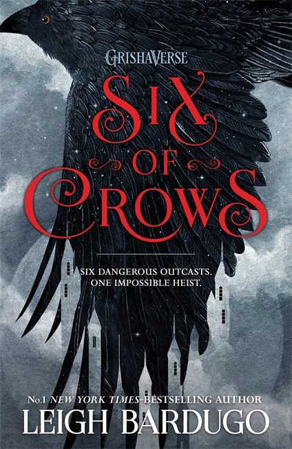  Book cover of 'Six of Crows'. Cover is grey with a black crow flying across. The title is written in red letters, underneath which lies the author's name.