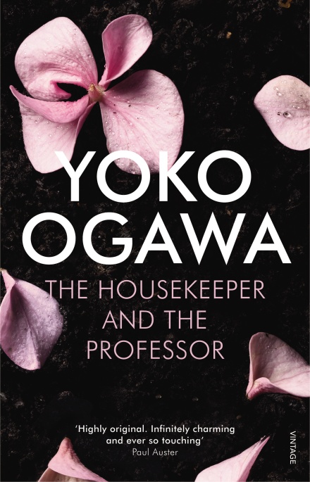 Book cover of 'The Housekeeper and the Professor'. Cover is black, with pink cherry blossoms around the edges. In the centre is the title, written in white text.